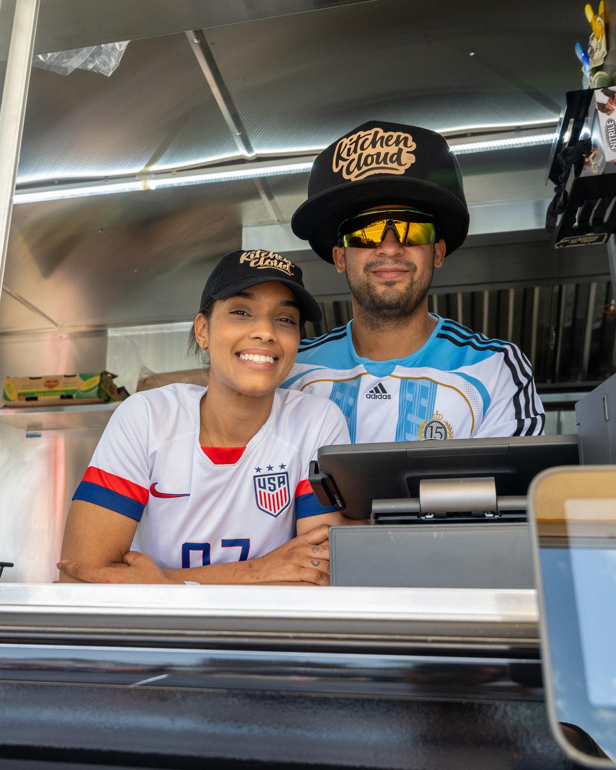 Claudy and James wearing Kitchen Cloud hats together